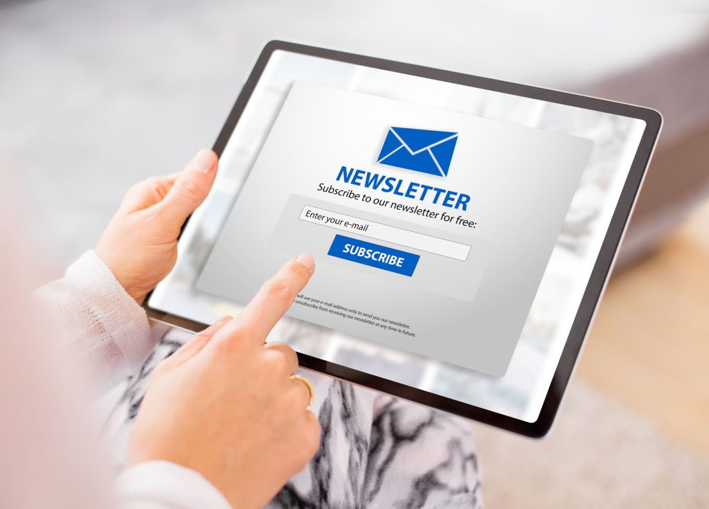 woman subscribing weekly newsletter online