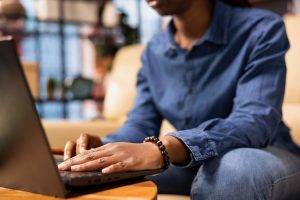 person home browsing internet laptop researching information