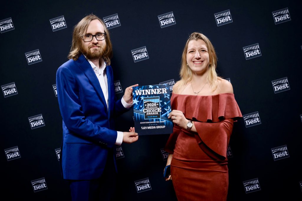 Taylor and Allison holding 2026 South Bend Tribune Community Choice Award for Best Advertising Agency